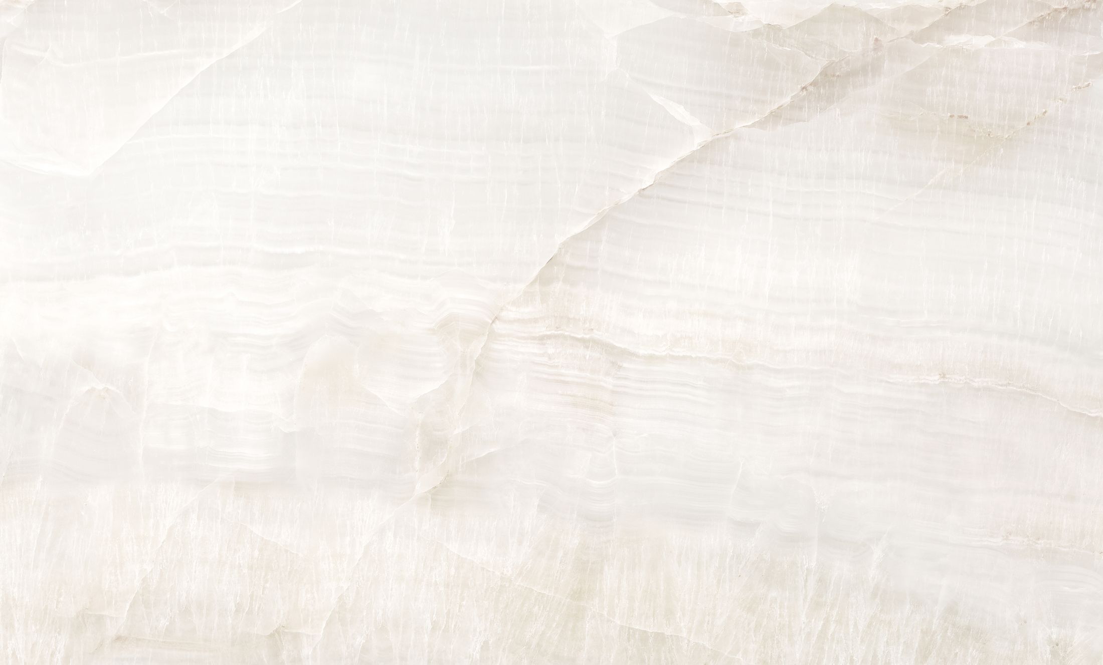 Textured white stone background with subtle patterns.