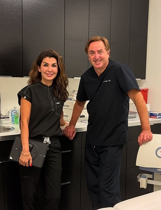 Woman with short hair in soft sunlight.