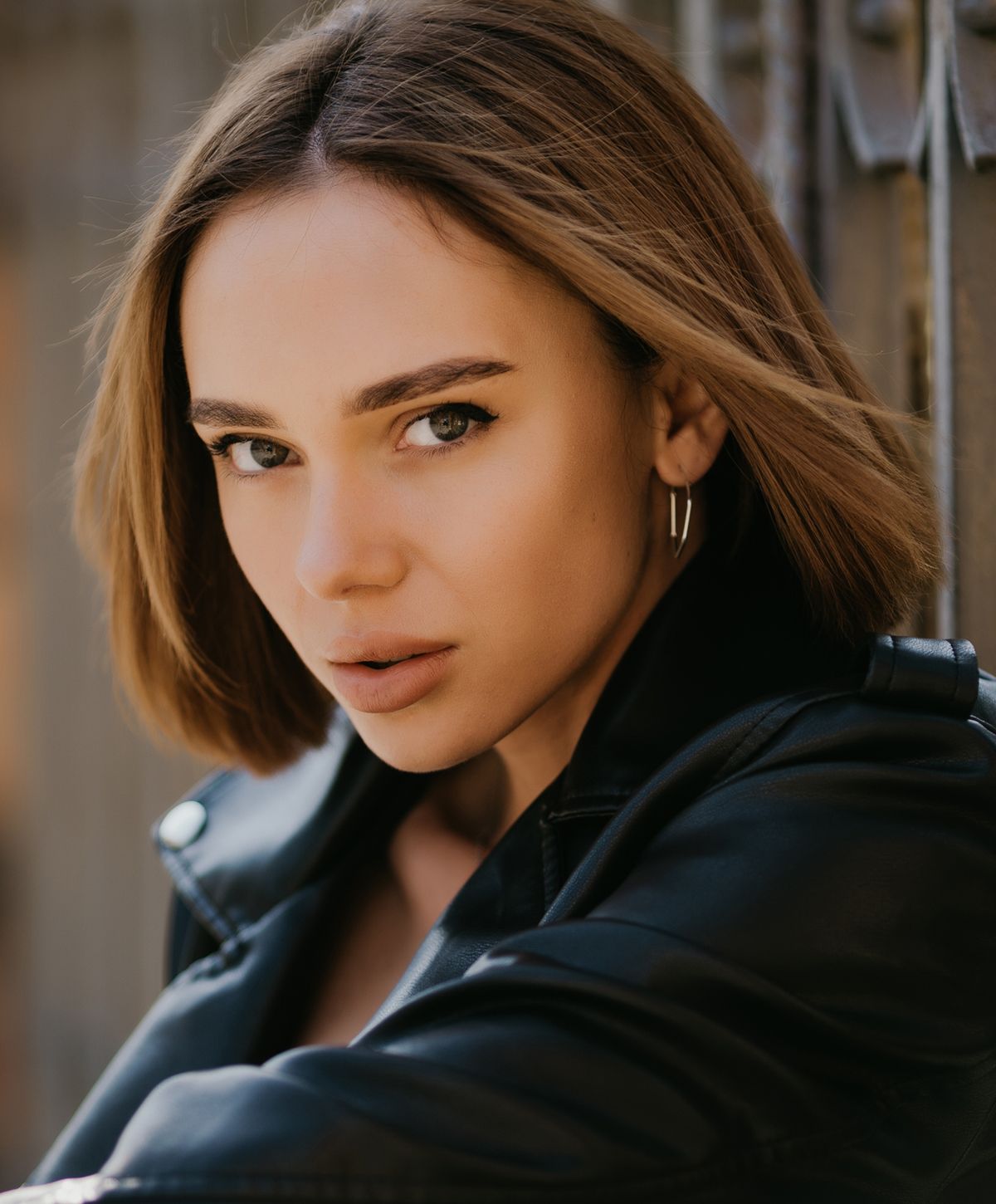 Portrait of a woman in a leather jacket.