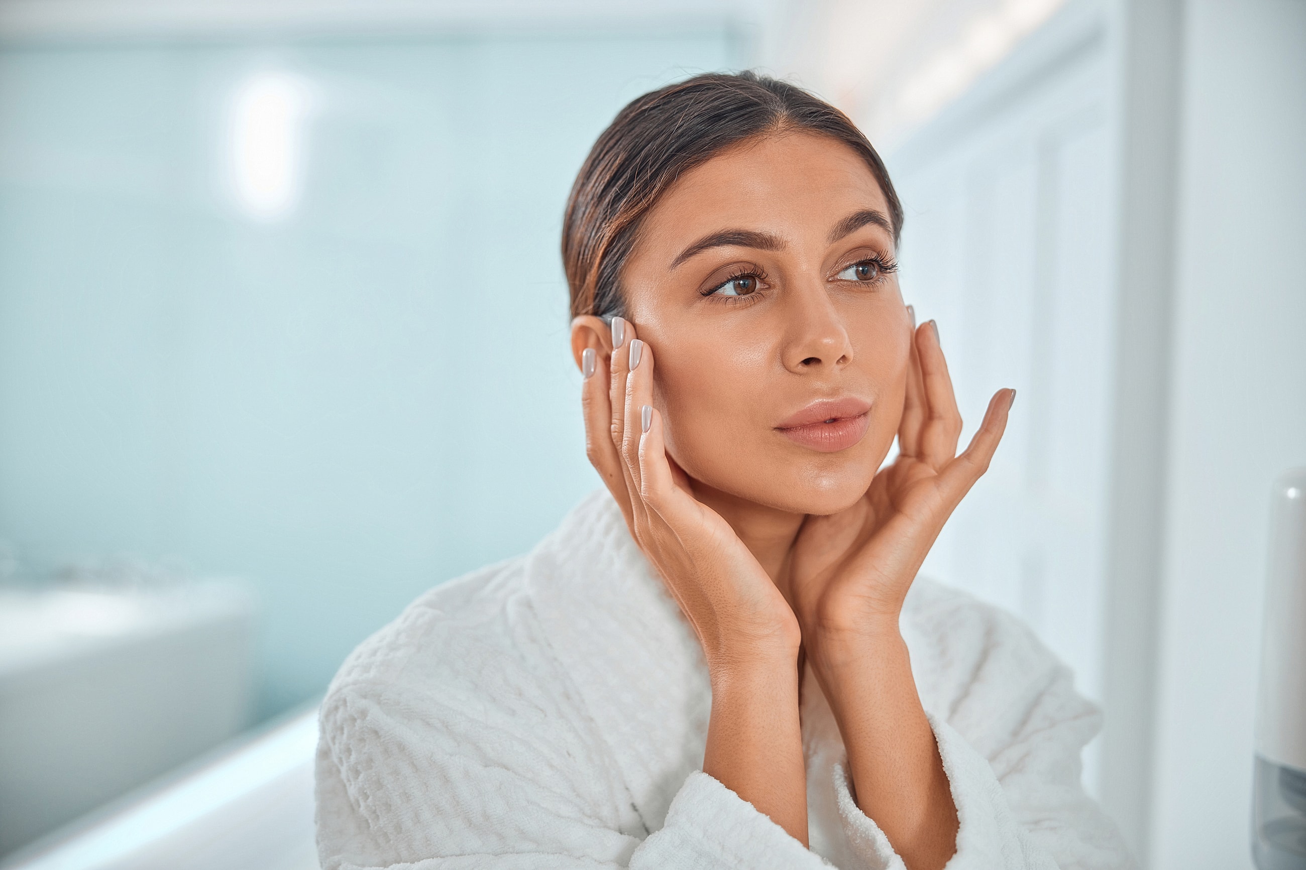Portrait of a woman with long dark hair.
