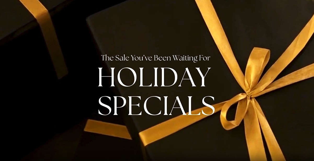 Woman with stylish blonde hair and natural makeup.