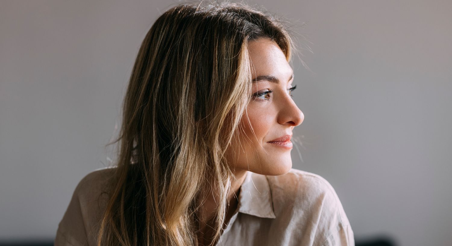 Profile of a woman with long hair.